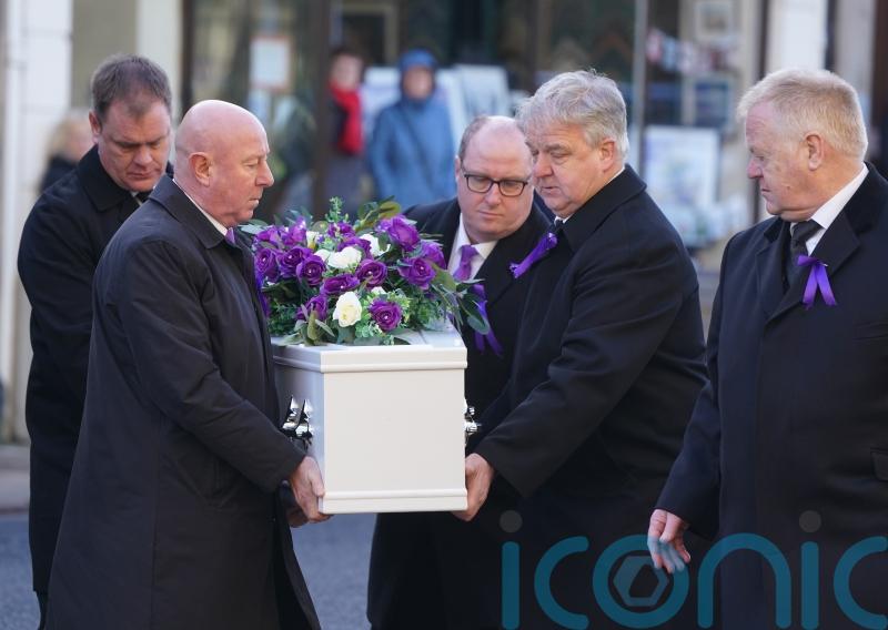 Mourners wear purple at funeral for teenager Holly Newton