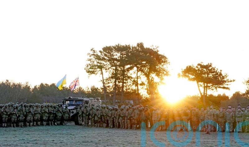 Ukrainian army trainees mark anniversary of Russian invasion at UK training camp