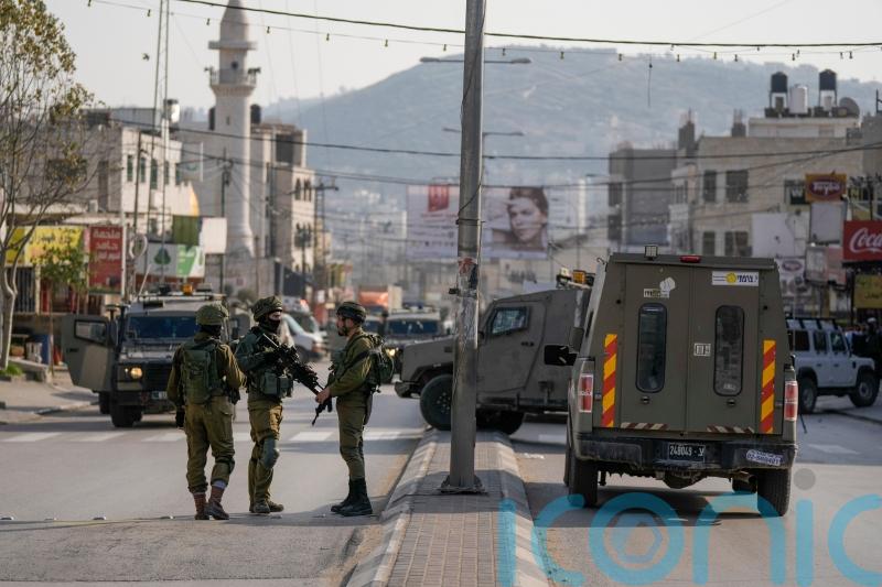 Israeli settlers go on violent rampage after Palestinian gunman kills two