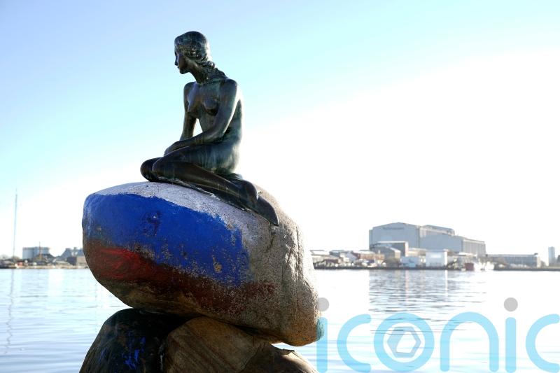 Vandals paint Copenhagen’s Little Mermaid statue in colours of Russian flag