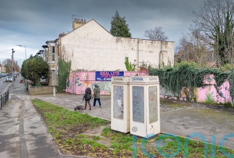 Nine rare cream-coloured phone boxes receive listed status