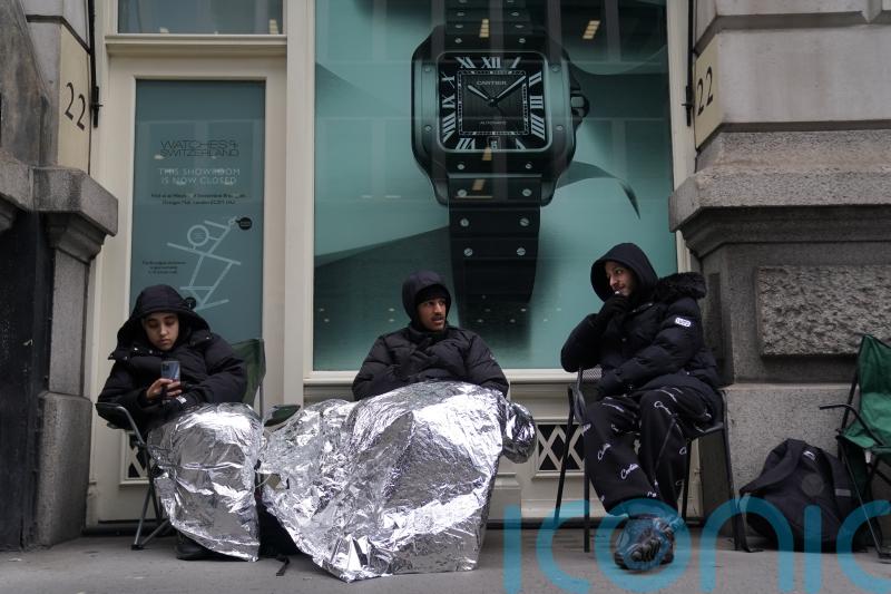 Father and son collectors queue overnight for limited edition watch