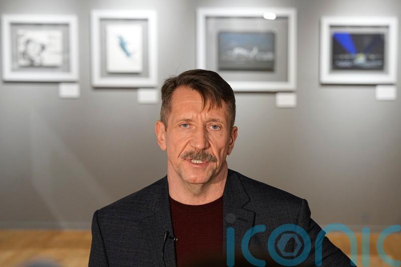 Merchant of Death shows off art in Moscow after prisoner swap with basketballer