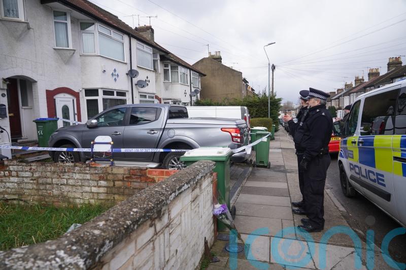 Woman and two boys found dead inside London house