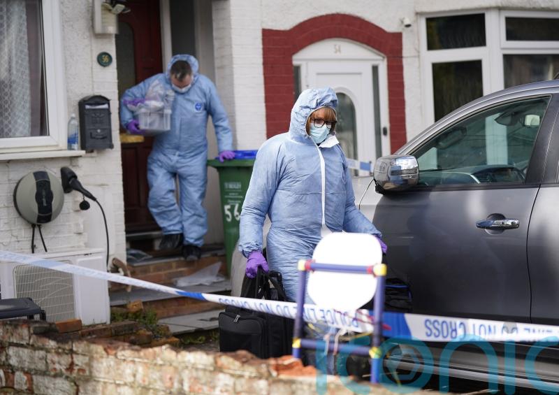 Mother and two sons found dead in house named by police