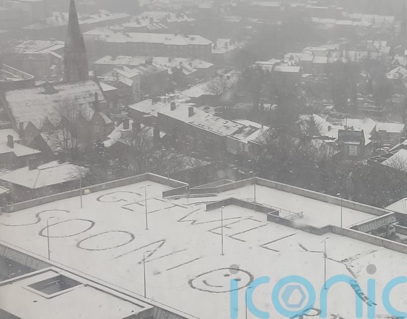 Hospital visitors spot giant ‘get well soon’ message in snow on car park roof