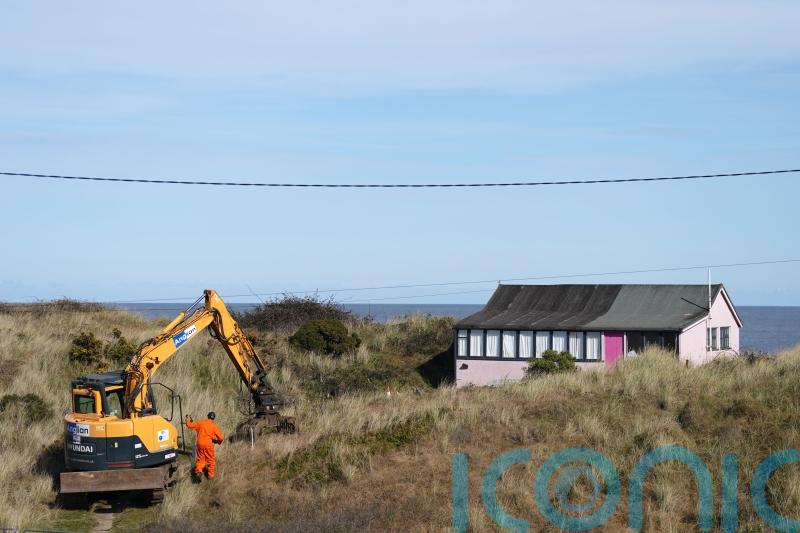 Clifftop home demolished as councillor warns of impact on local economy