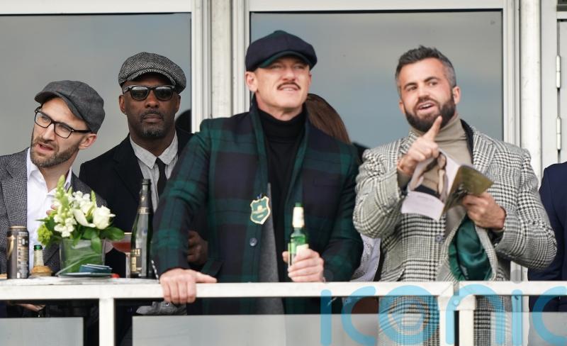 Idris Elba and Luke Evans sport flat caps on final day of Cheltenham Festival