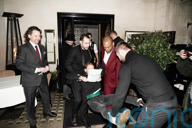 Climate activists carry out sit-down protest at high-end London restaurant