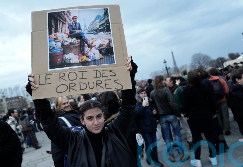 Paris streets calm after pension reform protests as rubbish piles up