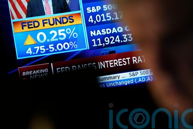 Stocks fall and bond yields tumble after Fed’s latest interest rate hike
