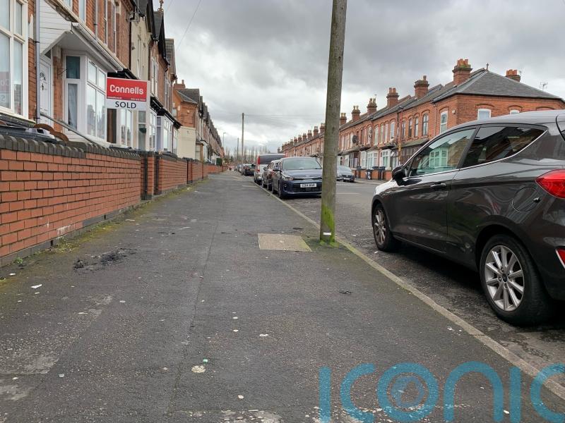 Man charged with attempted murder after two set alight in street
