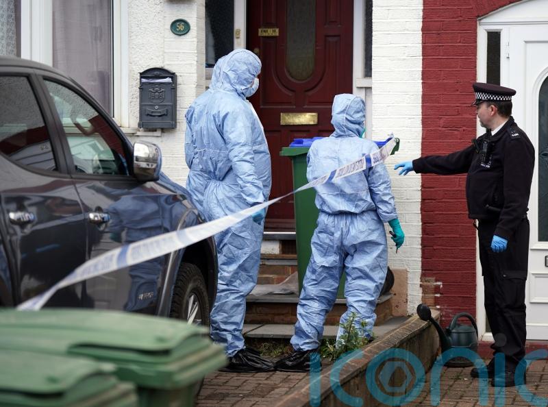 Two boys found dead at home with their mother had been strangled, inquest told