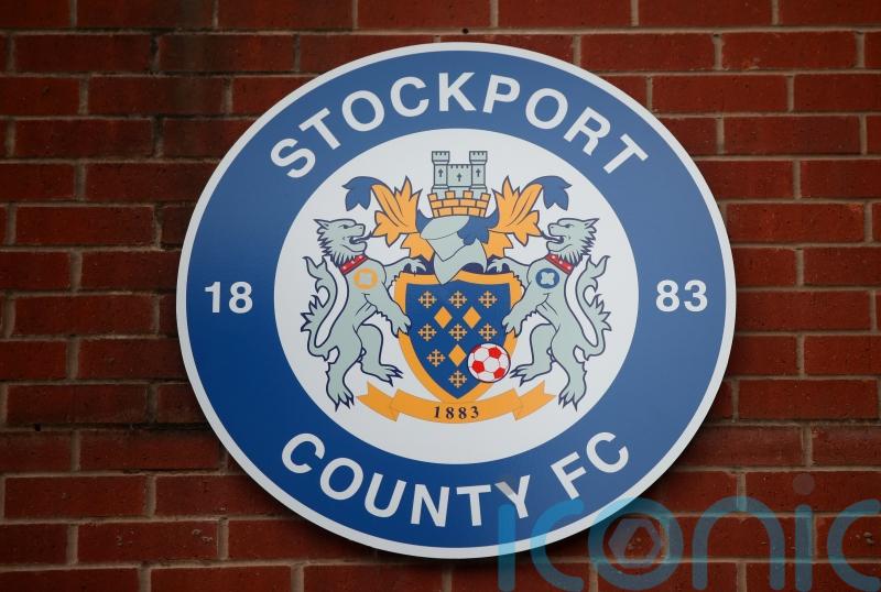 Stockport end 10-man Swindon’s resistance with late Ryan Croasdale winner