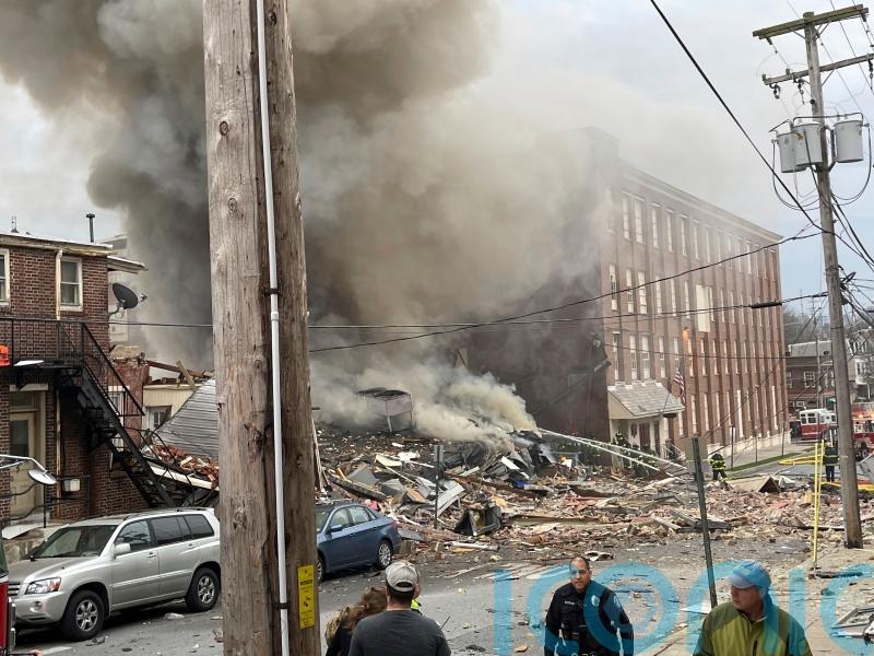 Rescuers search for four missing after three killed in chocolate factory blast