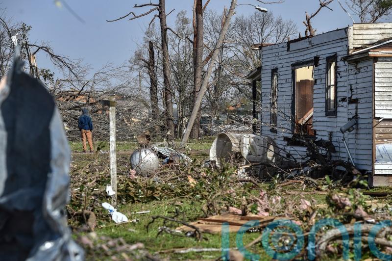 Biden declares emergency as crews dig through Deep South tornado wreckage