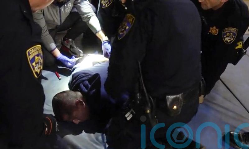 Highway patrol officers charged over death of man who said: I can’t breathe