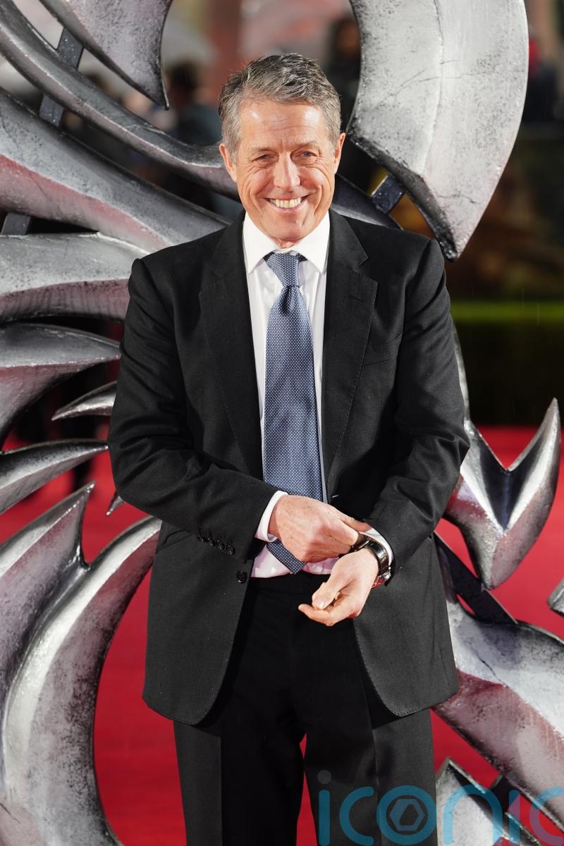 Hugh Grant says ‘sad’ presence of telephones on set affects actors’ behaviour