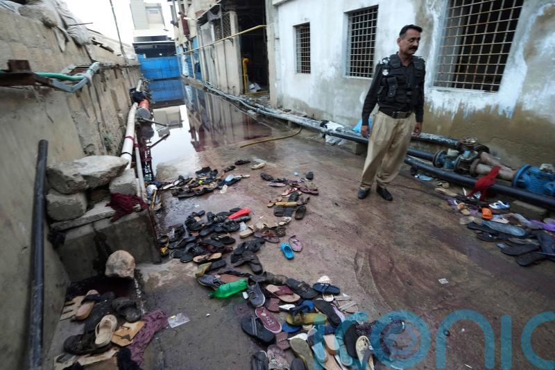 Pakistani police arrest eight after 12 killed in Ramadan food stampede