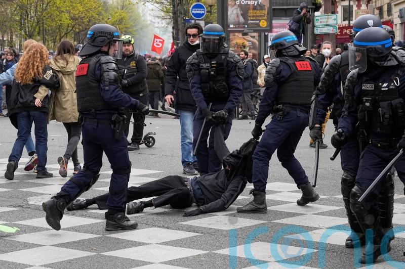 French police fire tear gas at protesters amid new strikes over pension reforms