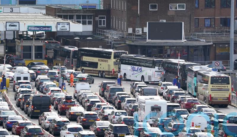 Holidaymakers forced to wait for hours amid large queues for trains and ferries