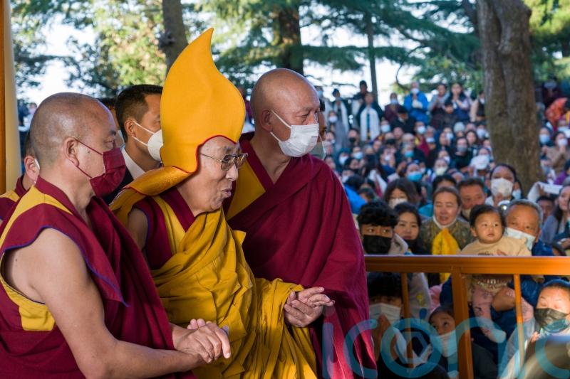 Dalai Lama apologises after video shows him kissing boy