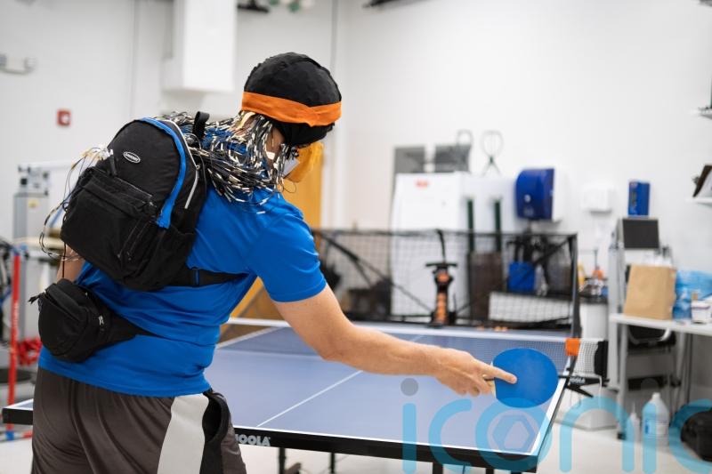 Playing sport against robots makes human brain work harder, research suggests