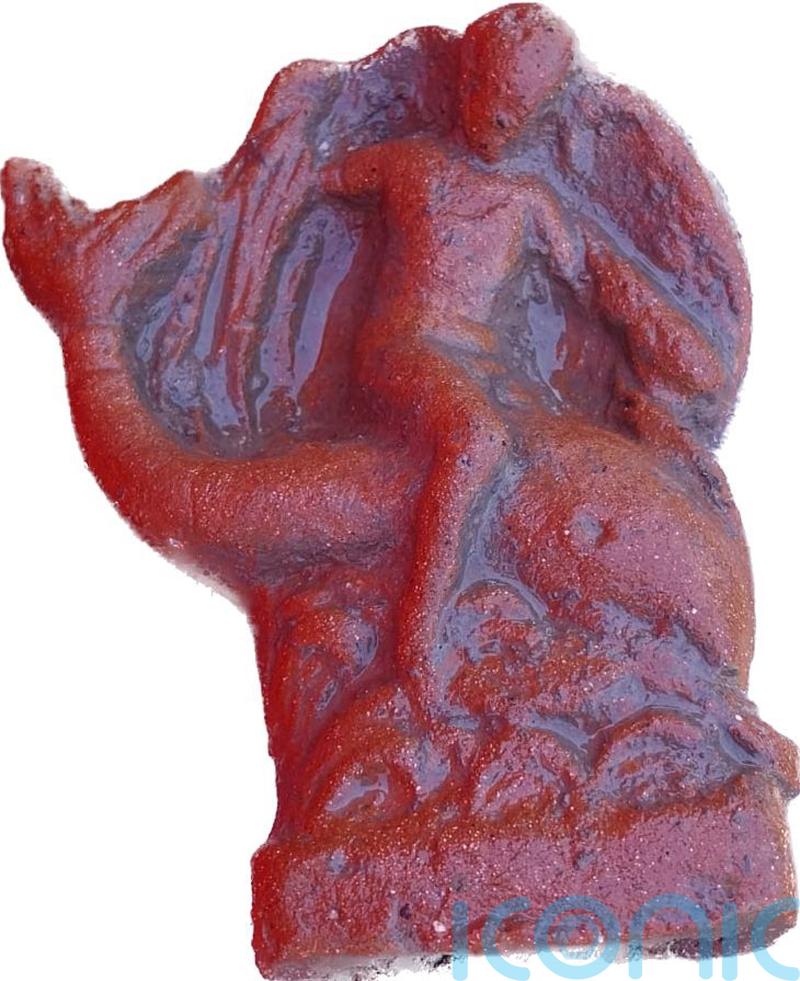 Archaeologists in Italy unearth ancient dolphin statuette