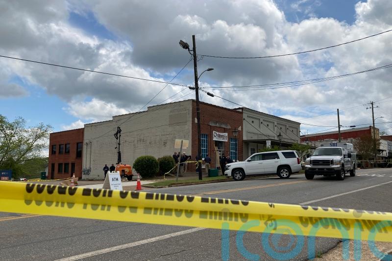 Talented football player among the dead in dance studio shooting