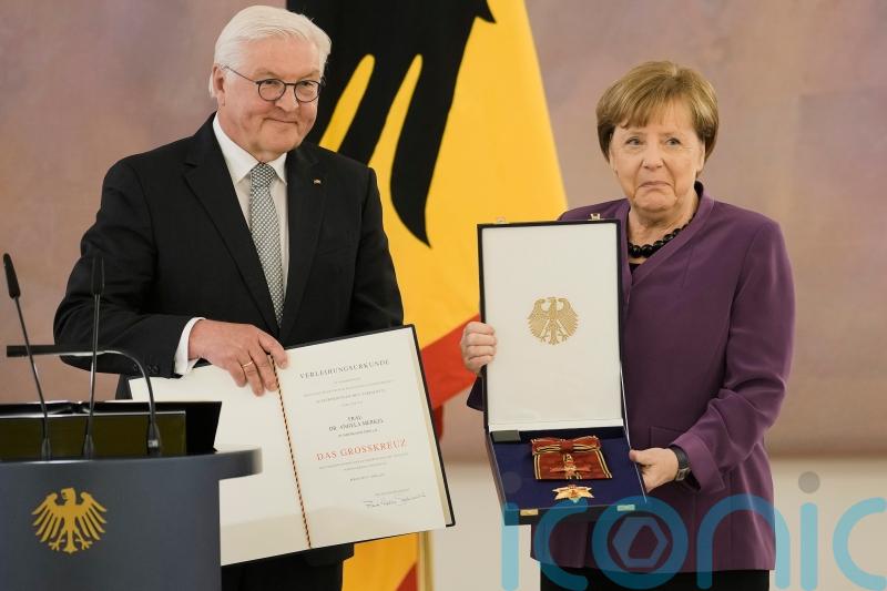 Ex-leader Angela Merkel decorated with highest German honour