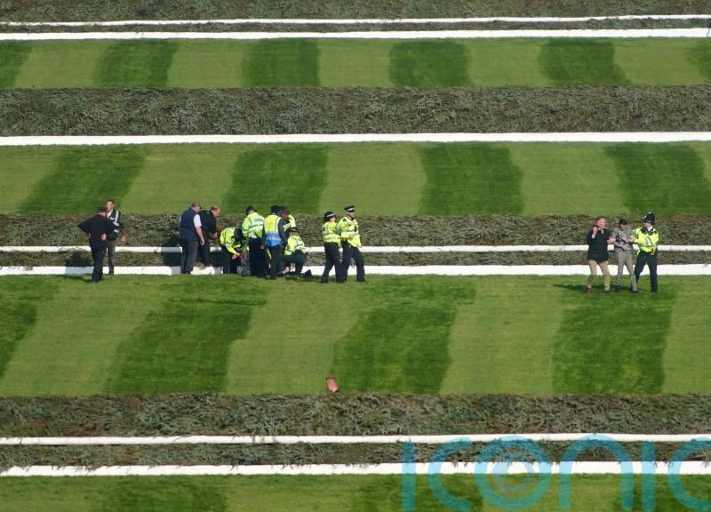 Protesters cause Grand National delay at Aintree