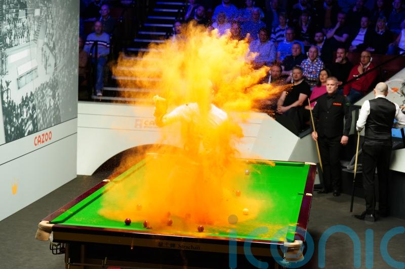Student and ex-museum worker in custody after World Snooker Championship protest