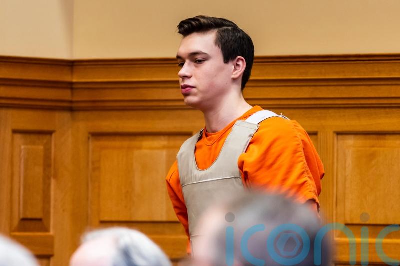 Teenagers plead guilty to murder after Iowa teacher’s killing