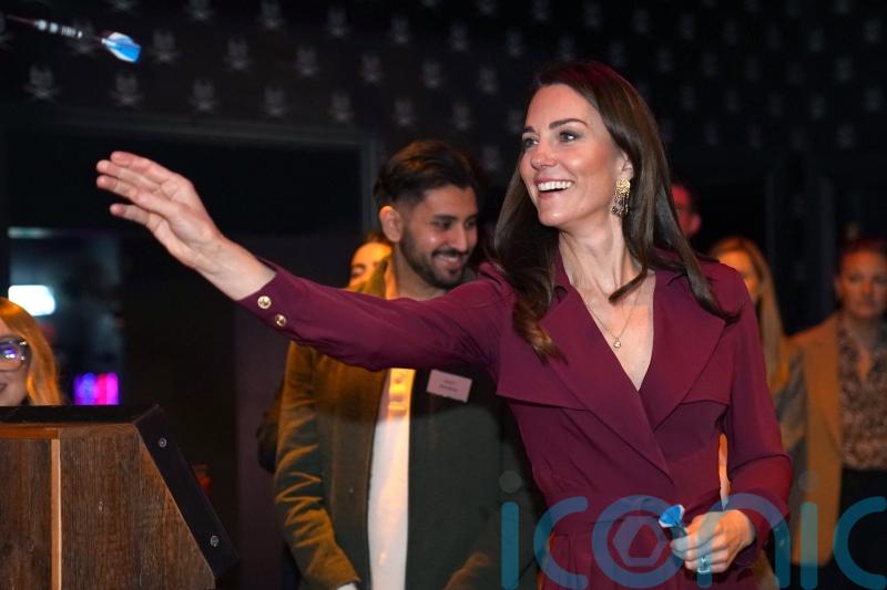 William and Kate take to the oche at pub’s underground darts bar