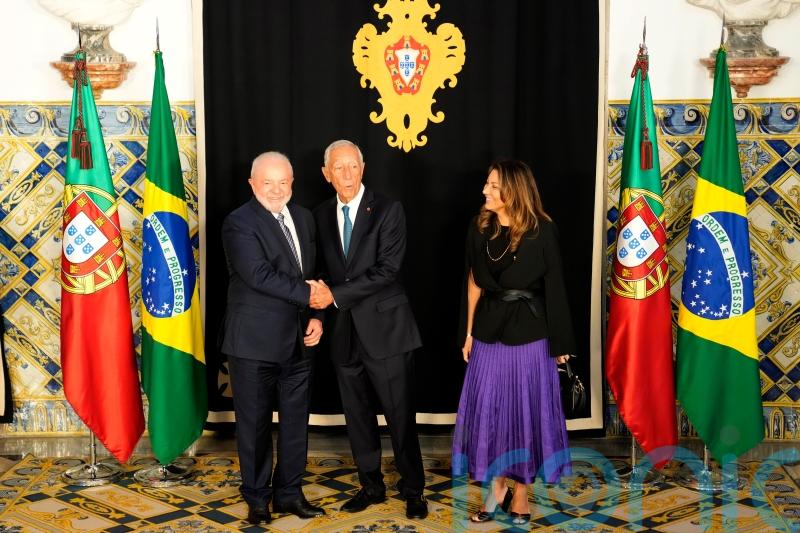 Brazil’s president begins visit to European ally Portugal