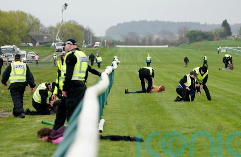 Number of arrests made after protesters try to stop Scottish Grand National