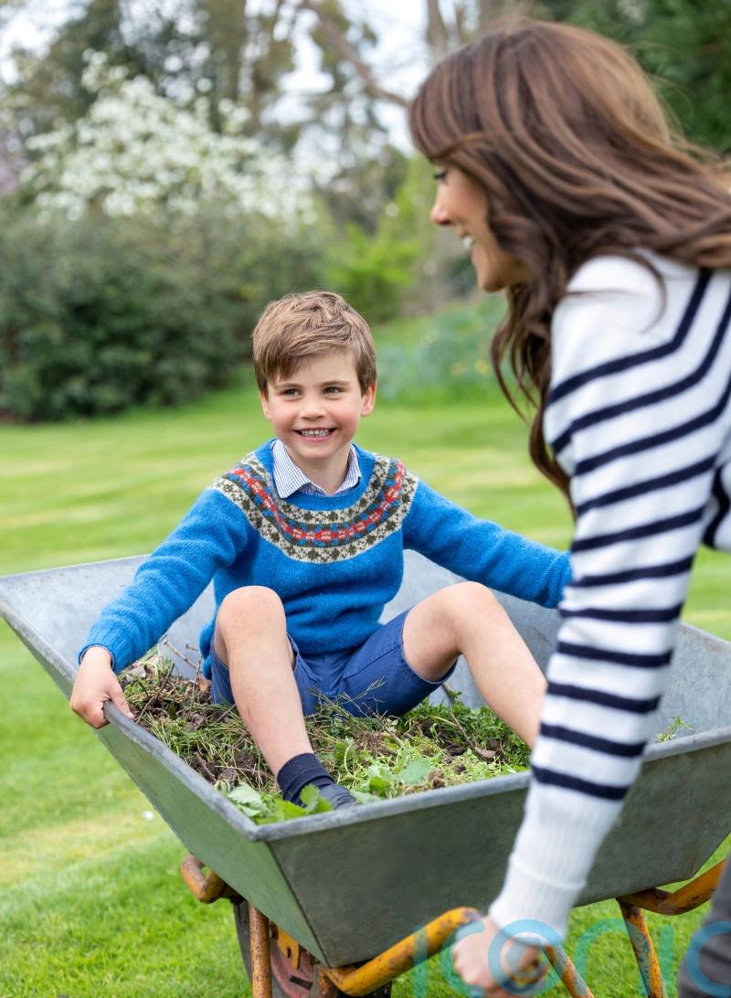 Prince Louis pictured being pushed in wheelbarrow by Kate before fifth birthday