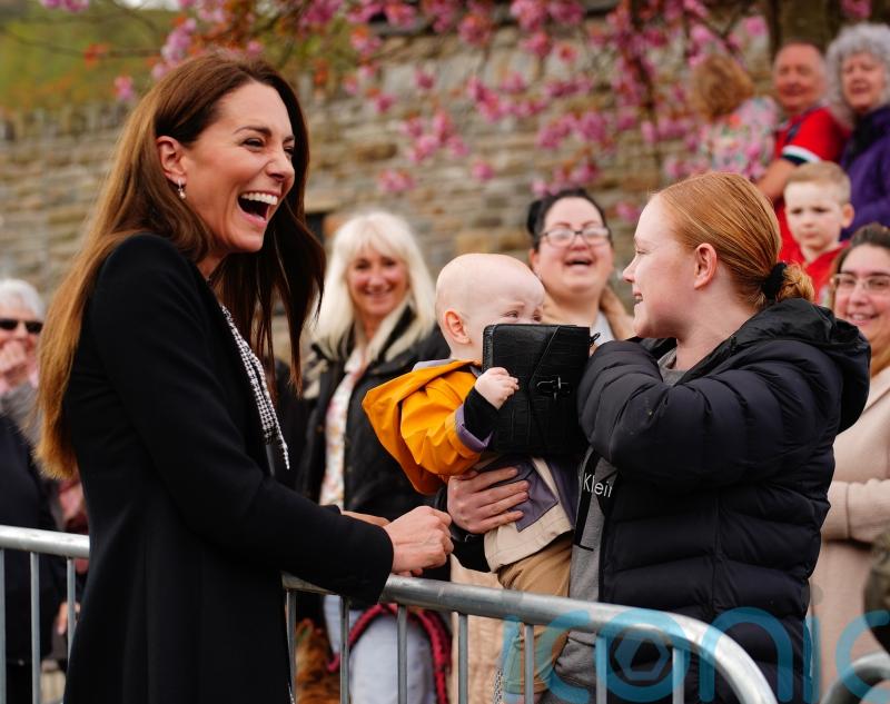 ‘Priceless’ moment as baby grabs Kate’s handbag during Aberfan visit