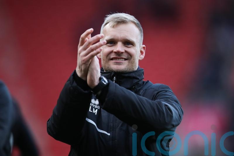 Liam Manning looking forward to beer with son after Oxford all-but secure safety