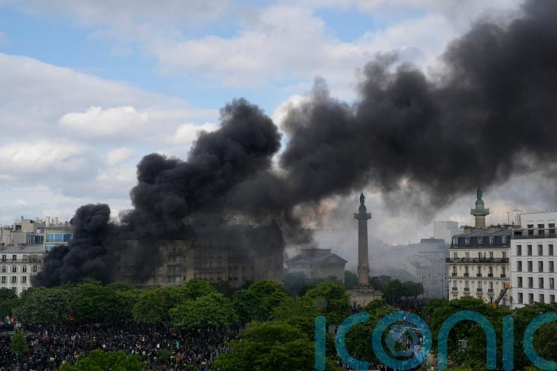 Pension anger sees violent protests in France amid May Day rallies across world