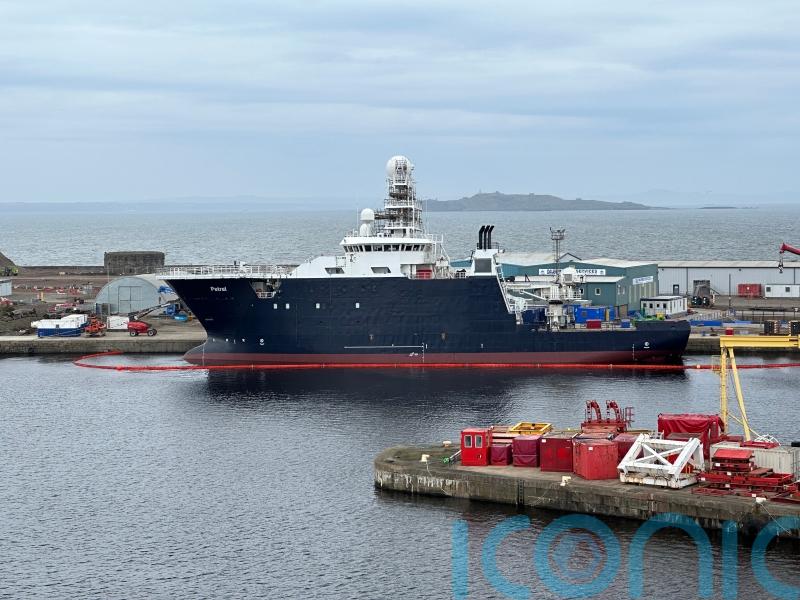 MV Petrel back in the water more than a month after toppling over in dry dock