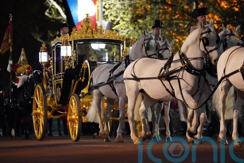 Royal fanatics line the Mall for early morning Coronation rehearsal