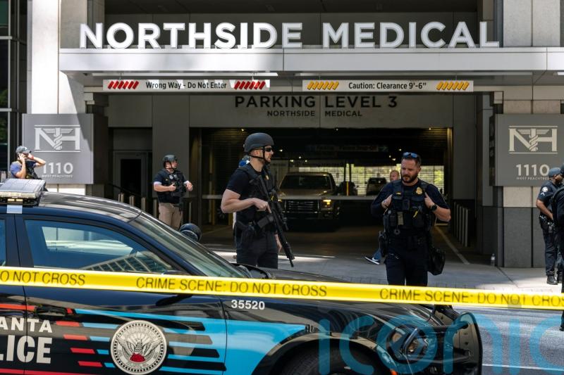 Man charged with murder after mass shooting in Atlanta