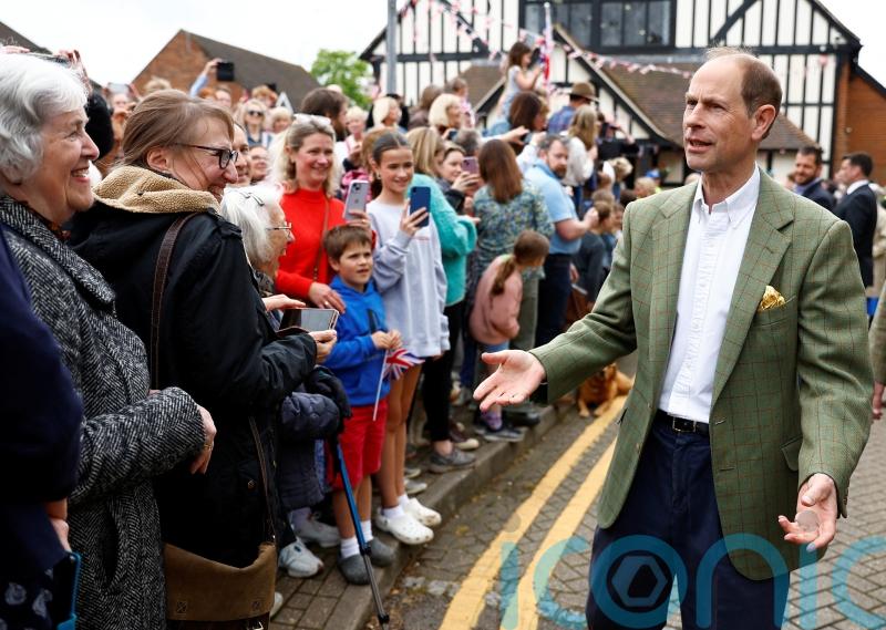 Thousands line village streets to greet Duke and Duchess of Edinburgh