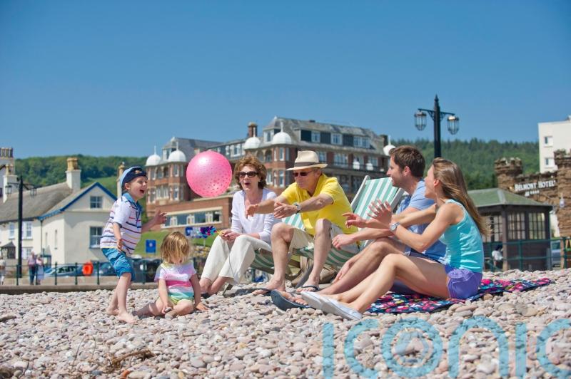 Intergenerational holidays popular as living costs squeeze budgets, survey finds
