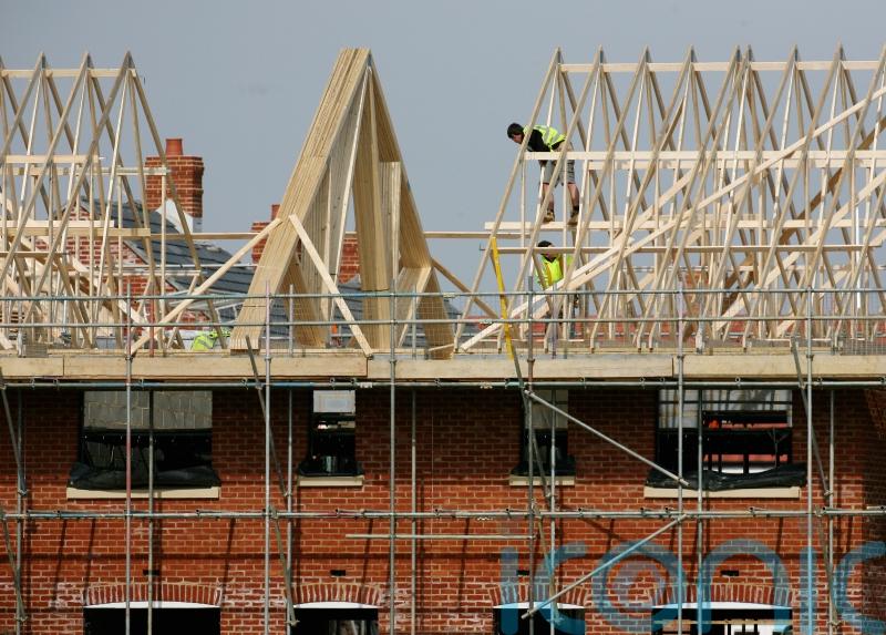 Builders help drag down FTSE after house prices stall