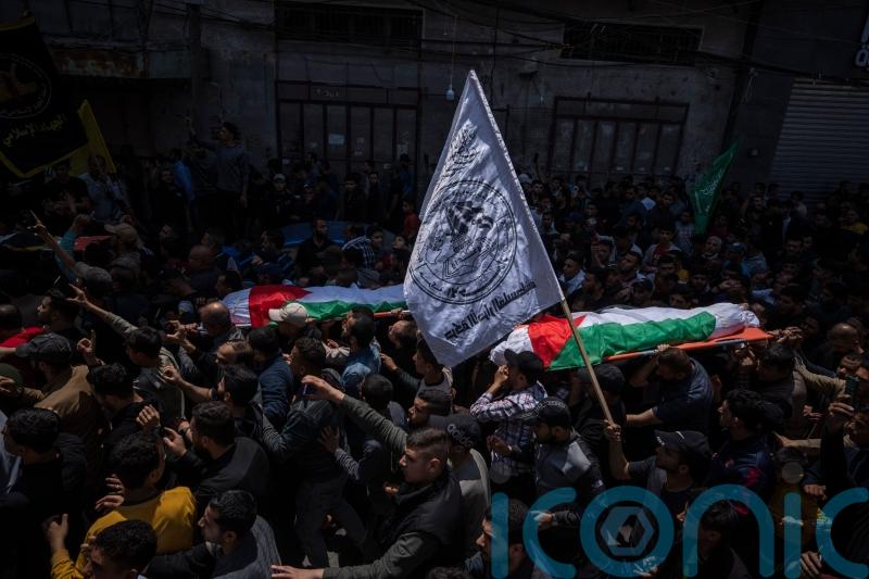 Israeli air strikes in Gaza kill three senior militants and 12 others