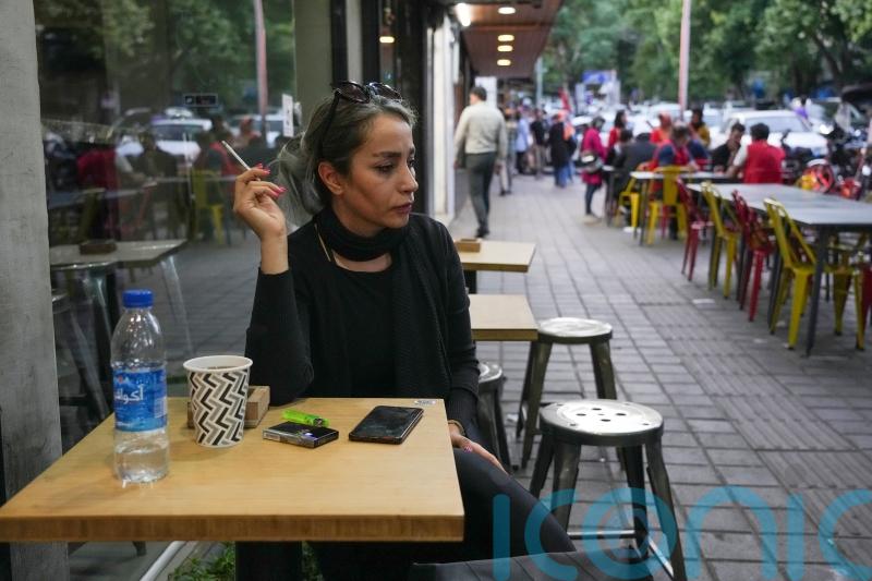 Iranian government pushes back as more women forgo hijab