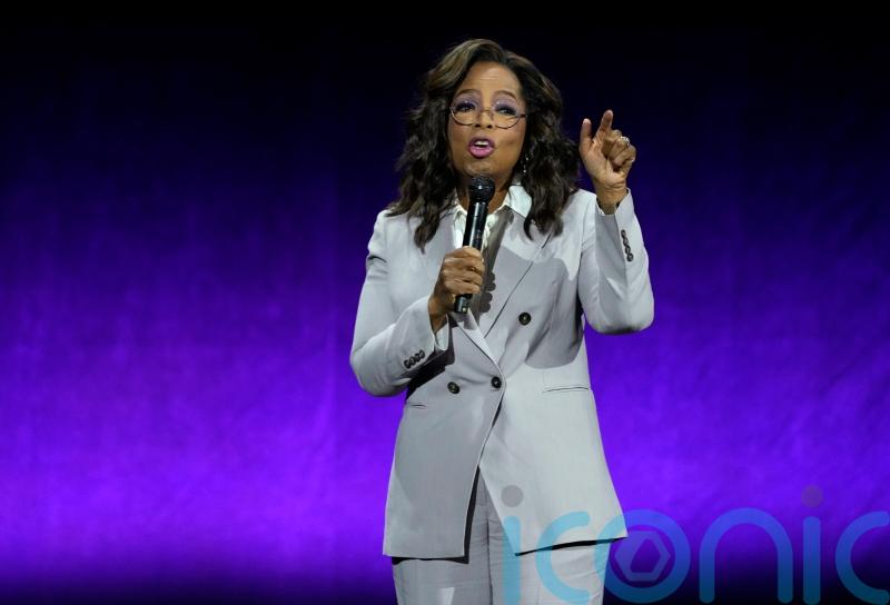 Oprah teams up with author Arthur C Brooks on book about happiness