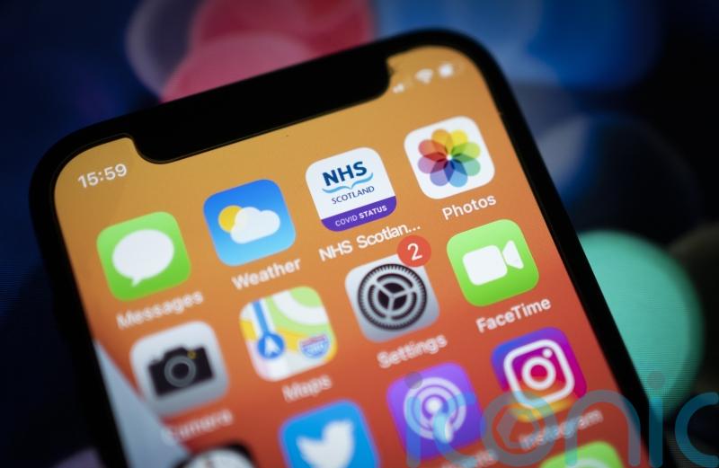 Phones should be banned in schools to tackle damage by pornography – MPs told